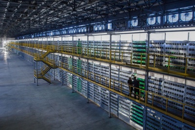 European mining farm with rows of GPU mining rigs